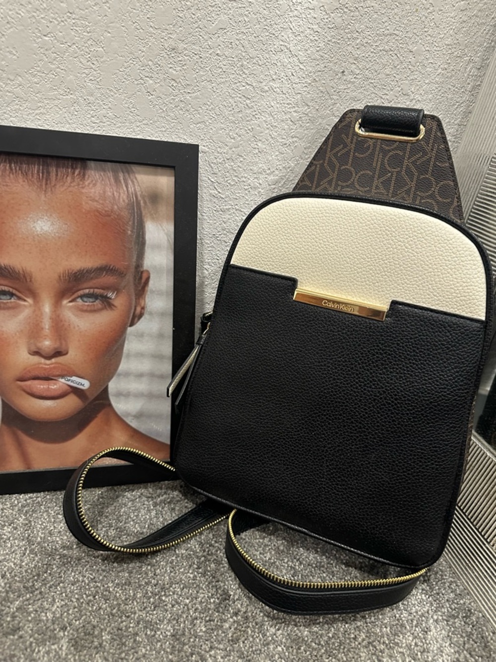 Calvin Klein Black & Ivory Logo Accent Pebbled Leather Sling Backpack